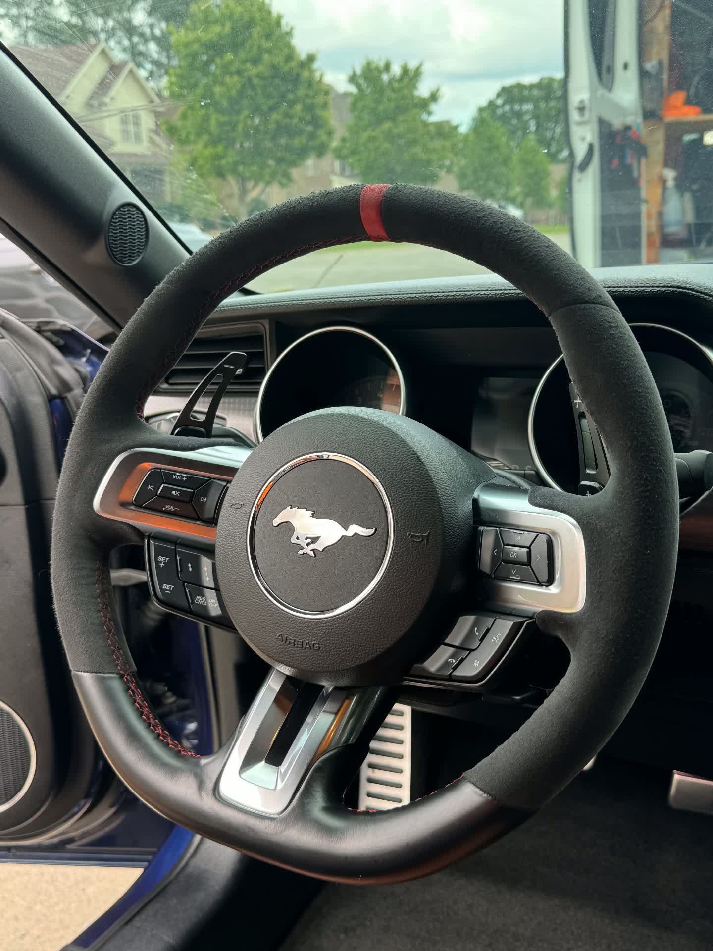 After: Mustang steering wheel detail — before & after
