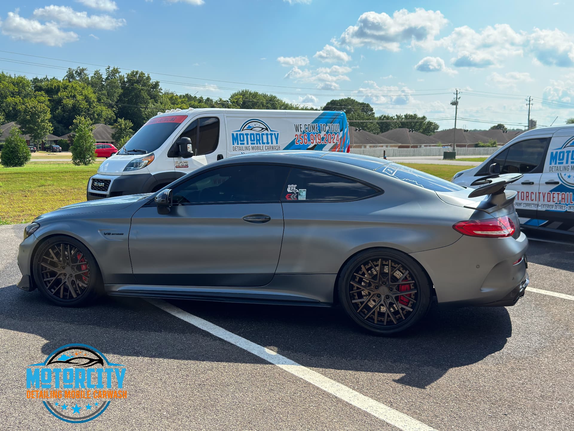 Ceramic coating detail on a grey Mercedes-AMG coupe at the customer's home