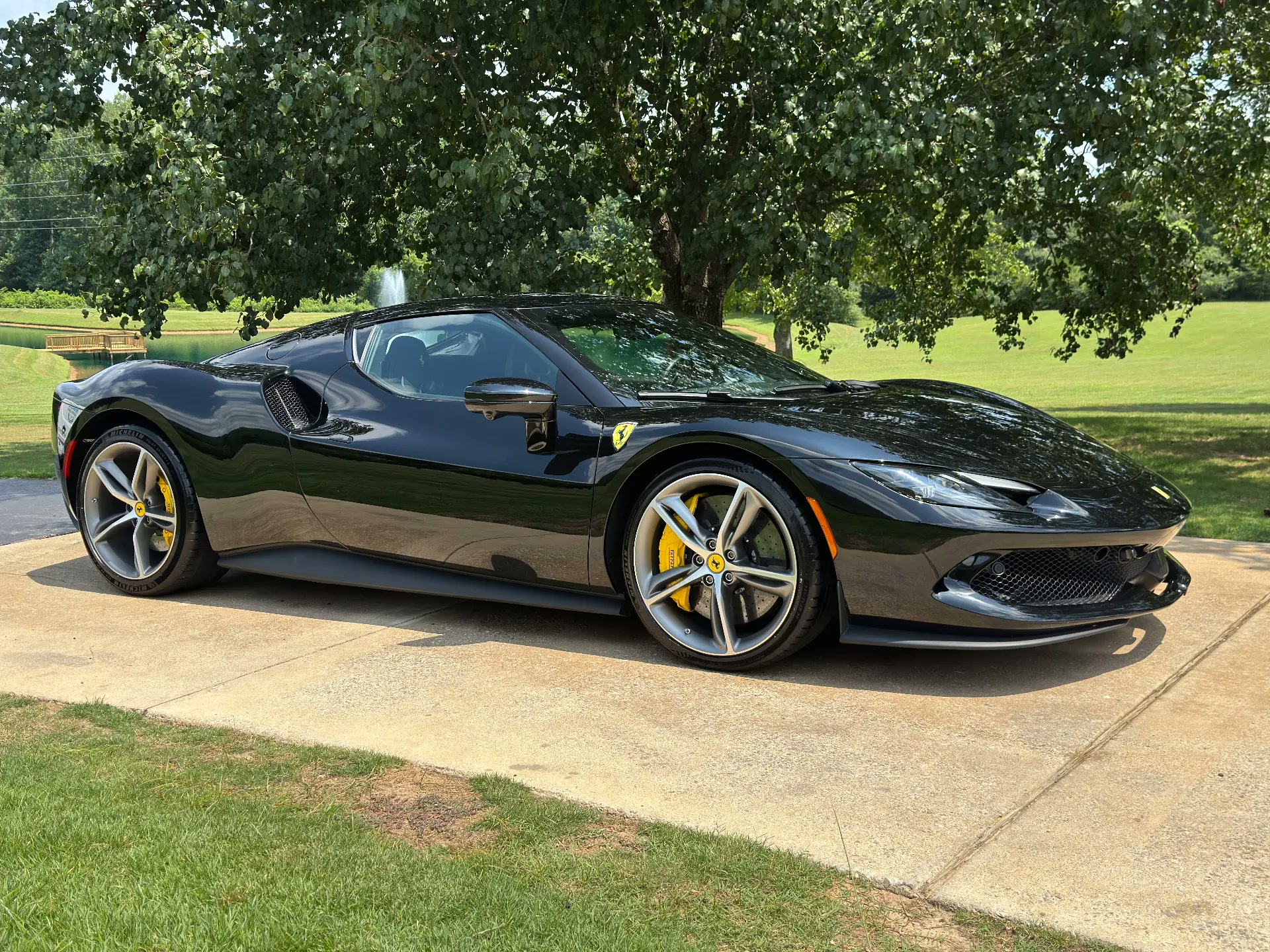 Black Ferrari 296 GTB after mobile detailing in Brentwood, TN