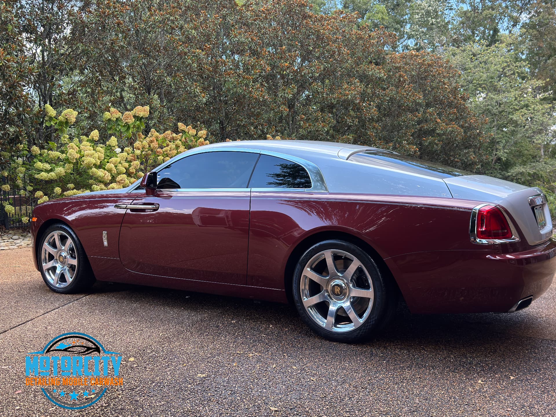 Paint correction gloss on the maroon paint of a Rolls-Royce Wraith