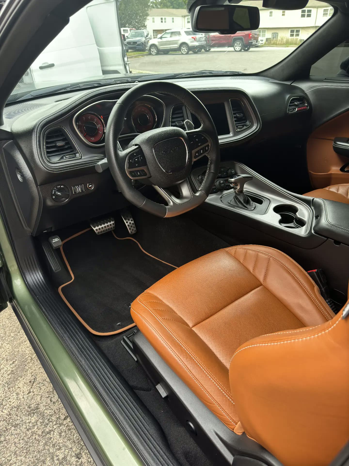 Dodge Challenger SRT cockpit with cleaned dash and saddle brown leather seats