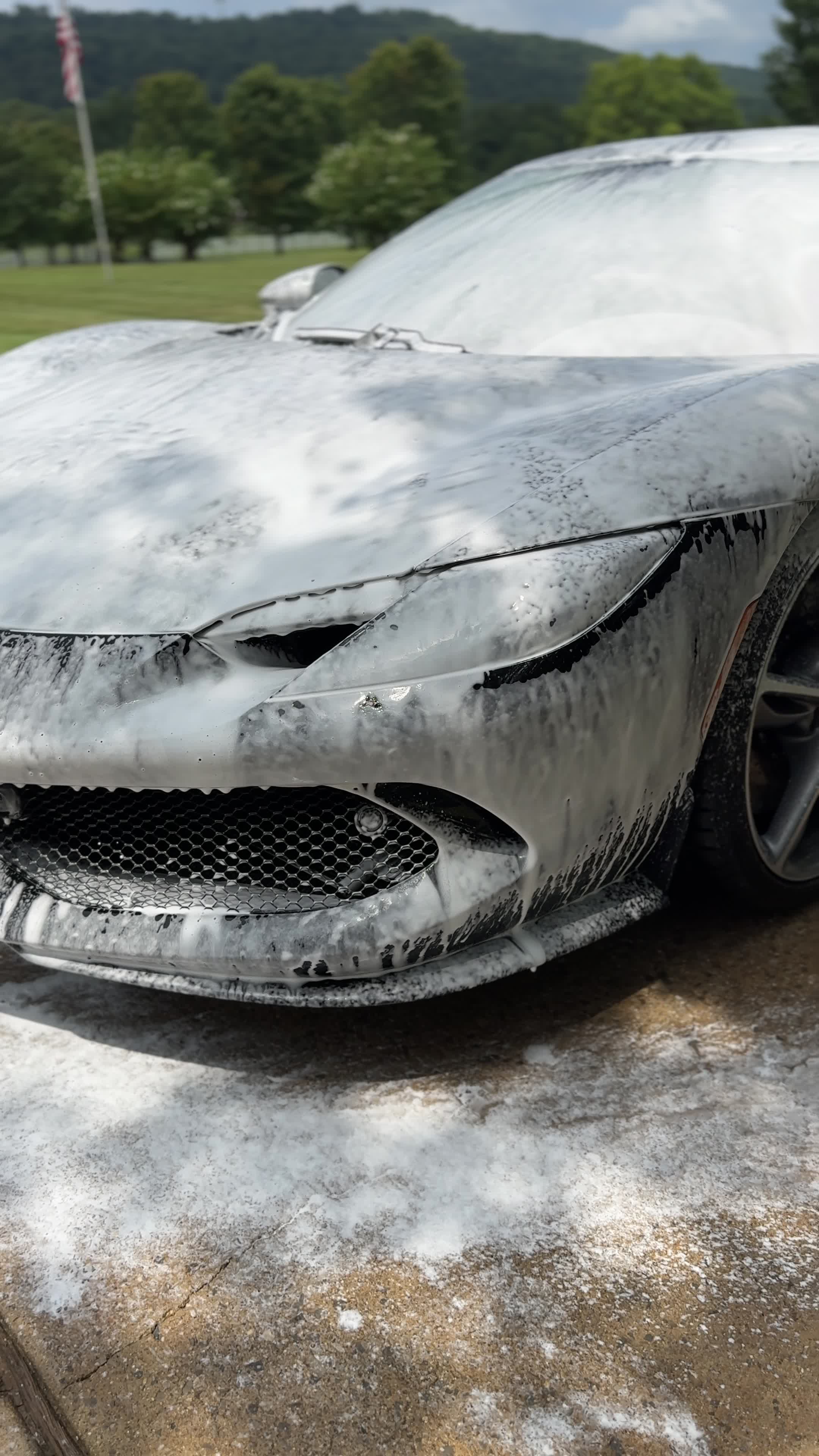 Snow foam bath applied during a Motorcity mobile wash and wax