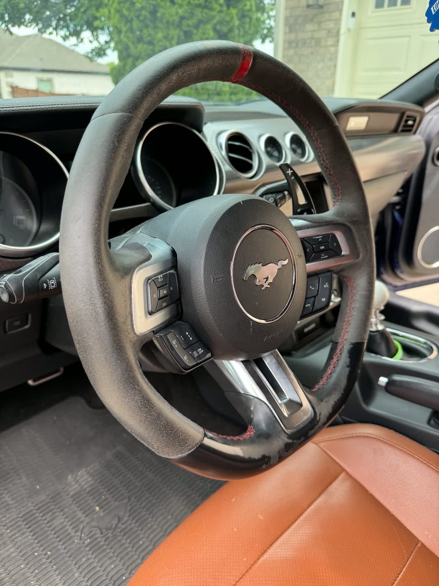 Before: Mustang steering wheel detail — before & after